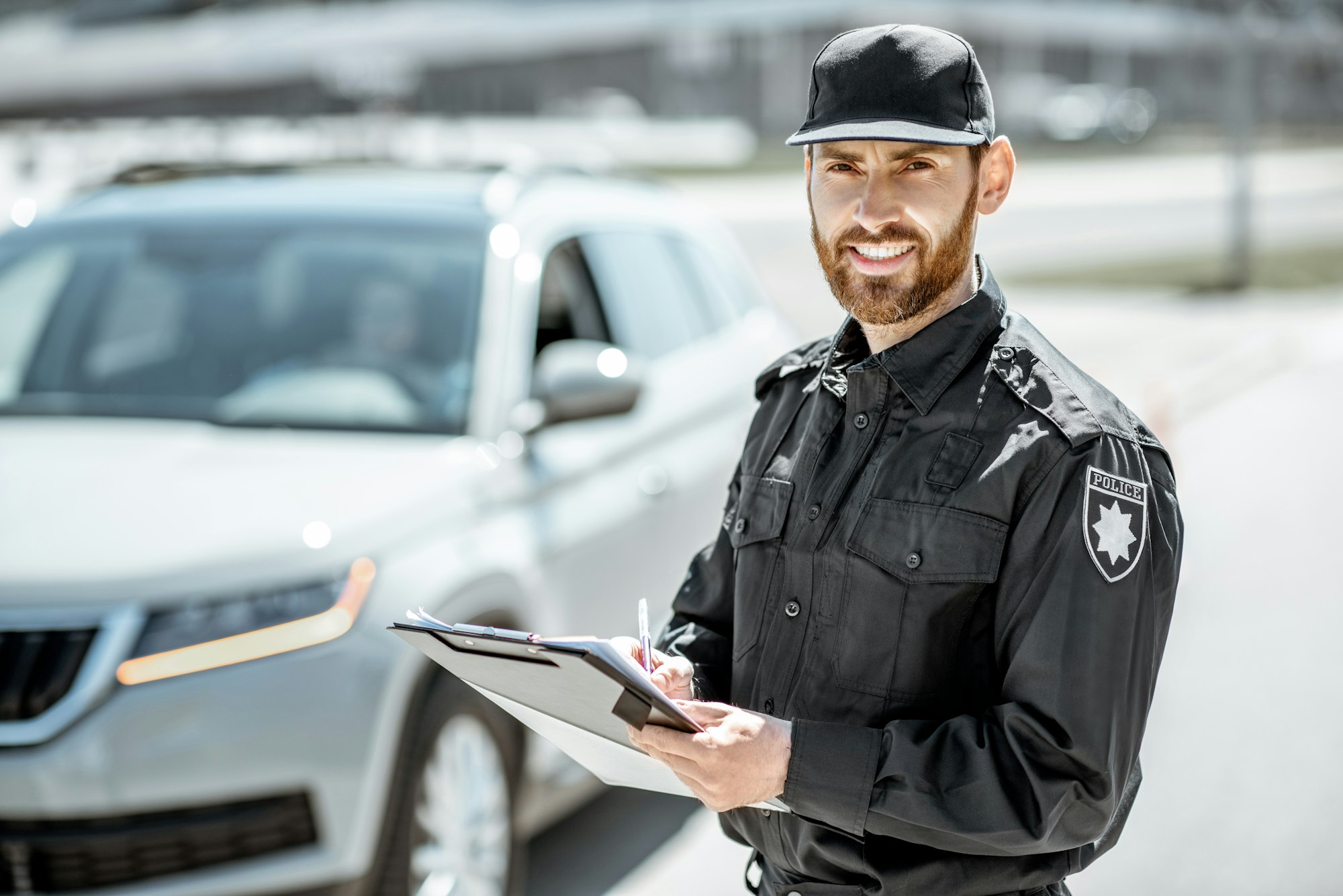 Portrait of a policeman on the road